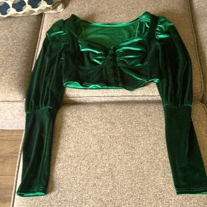 I’m selling a velvet emerald green busier shirt with long sleeves